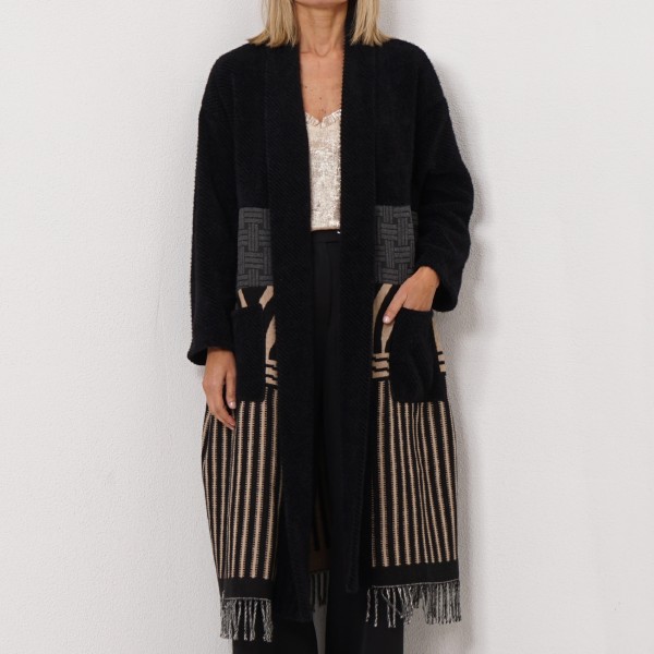 coat with mix of fabrics and fringes