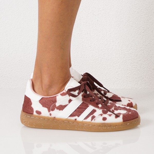 Slipper with embellishment