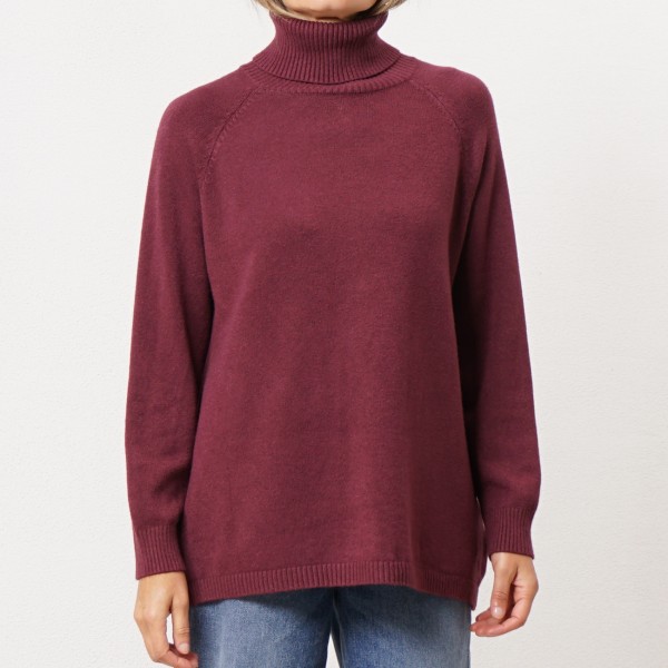 High-neck knit sweater with buttons on the back