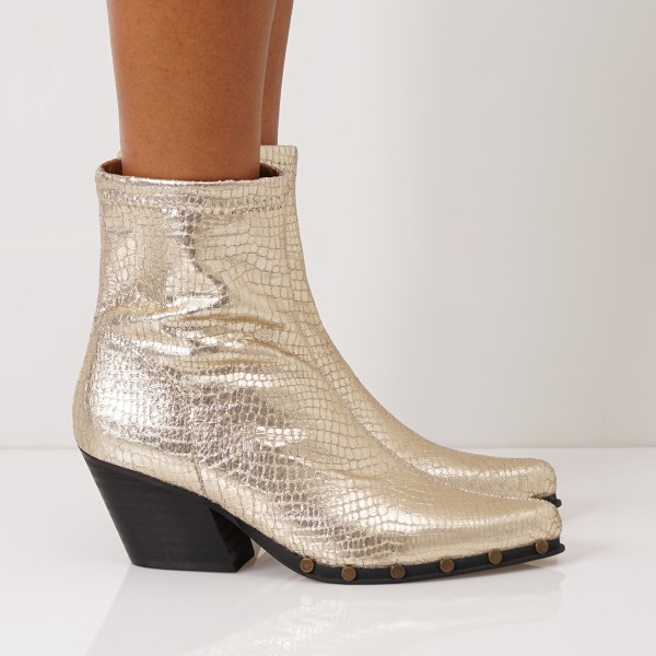 golden ankle boots with studs