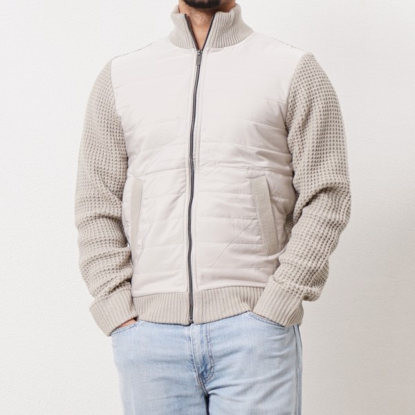 knitted jacket with quilted fabric application