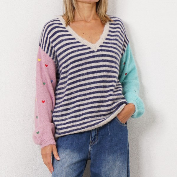 knitted sweater with embroidery on the sleeve