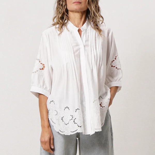 Embroidered blouse with pleats