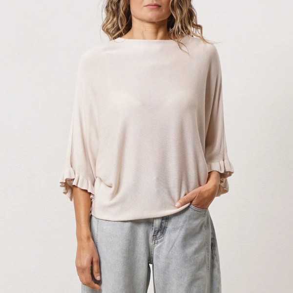 Knitted sweater with ruffles