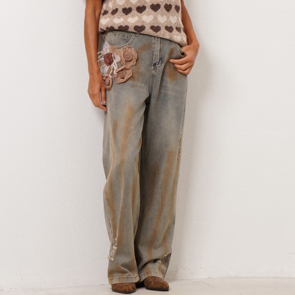 calça ganga vintage c/aplicações flor