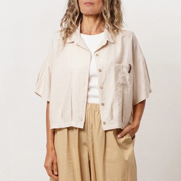 blusa em crepe assimétrica c/ bolso e costura