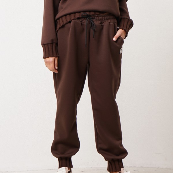 calça de malha (neopreno) c/ aplicação de malha